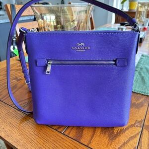 Coach Rowan File Bag. Crossbody.  9.5” x 9.5” Bright purple. Crossgrain leather.